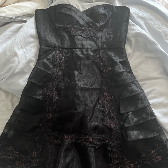 Bcbg size 6 black dress with some purple satin showing behind the lace. - Picture 2 of 7